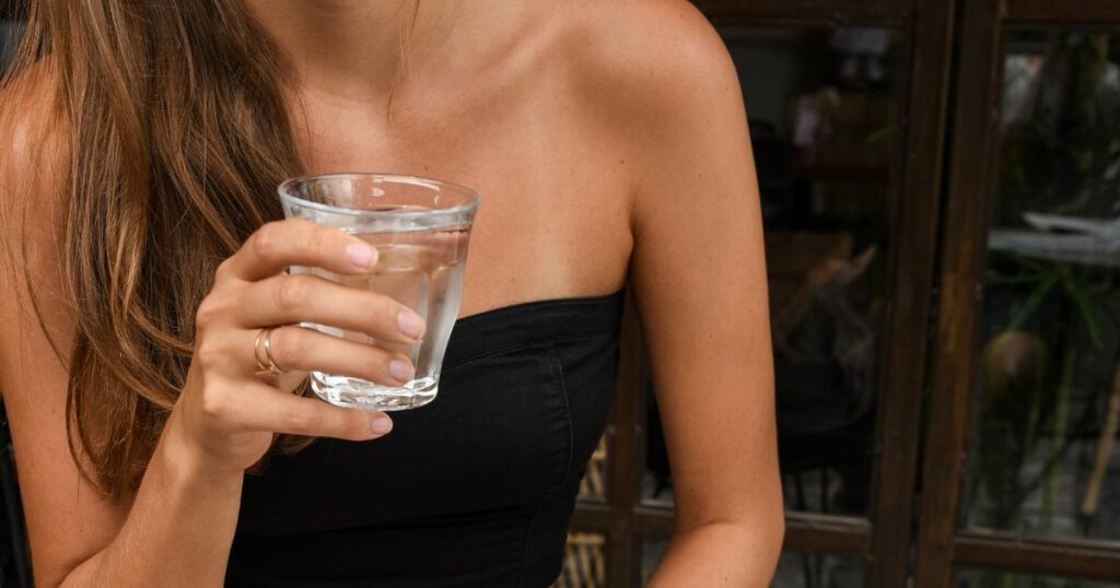 girl and water glass